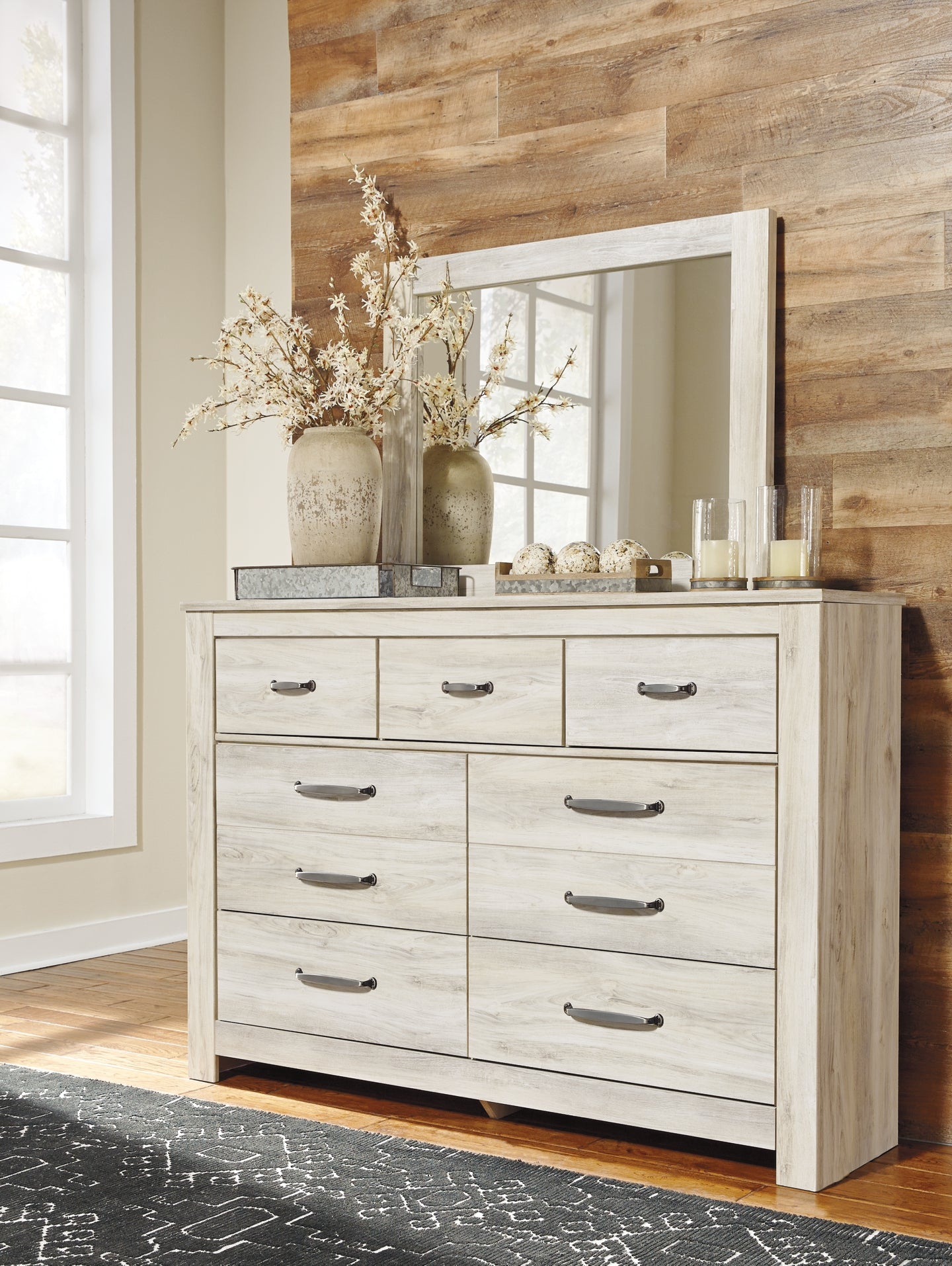 Bellaby Crossbuck Panel Bed With Mirrored Dresser