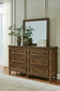 Sturlayne Queen Upholstered Panel Bed with Mirrored Dresser and Chest